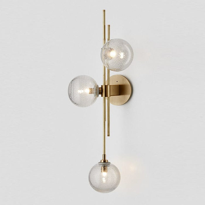 Lucien gold wall light