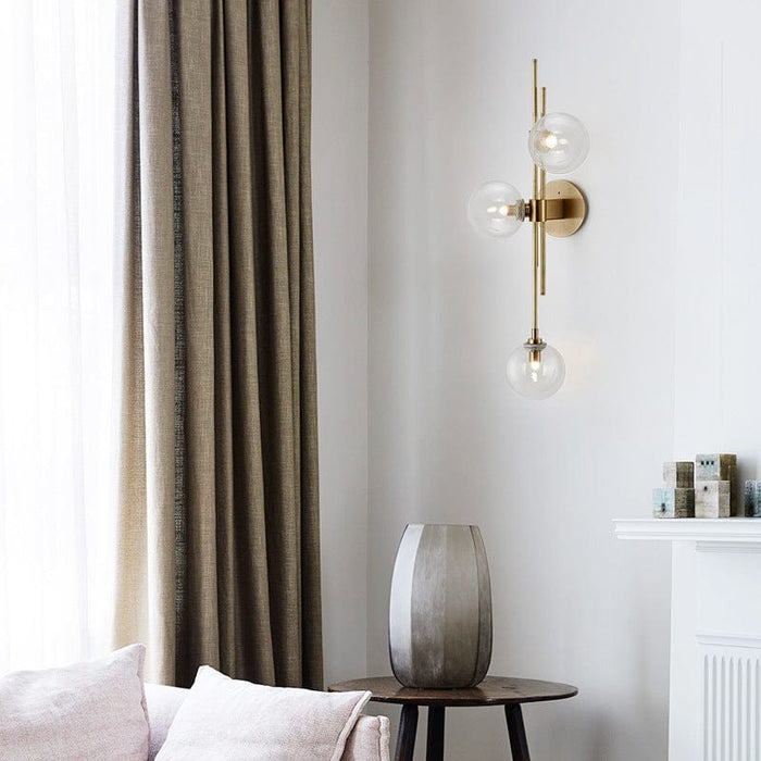 Lucien gold wall light