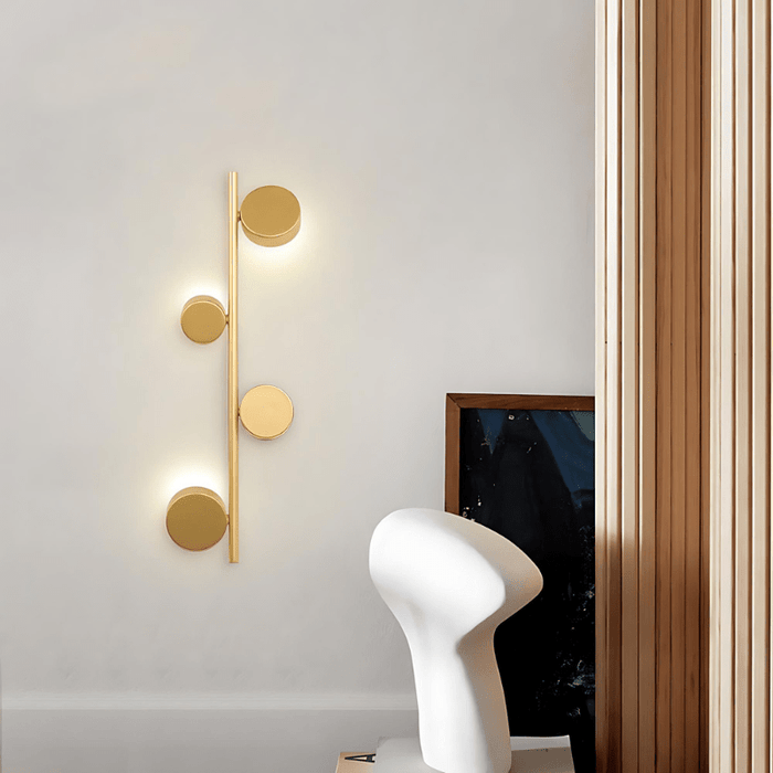 Sam gold wall light