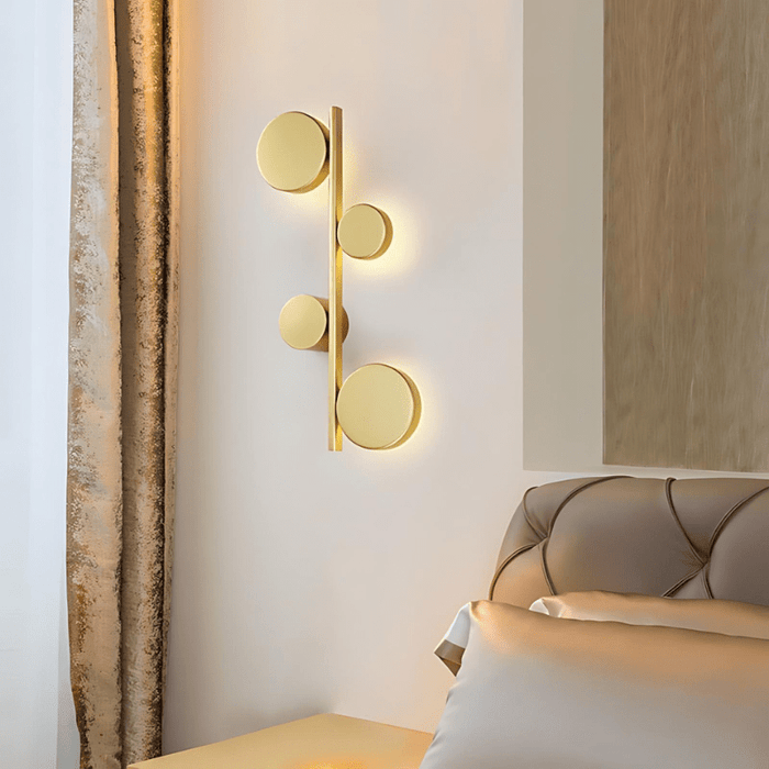 Sam gold wall light